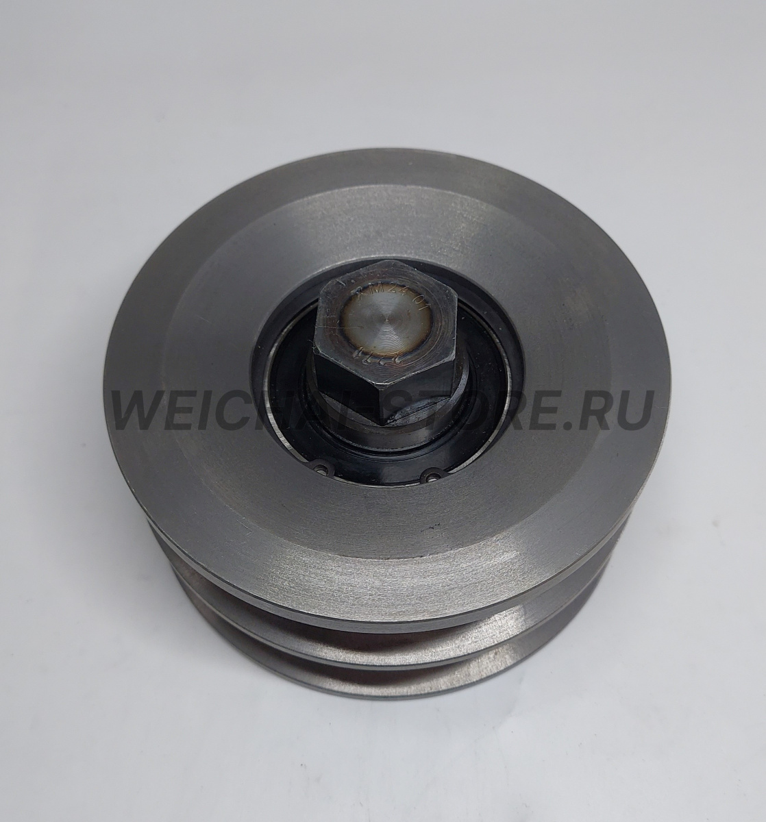 1000410660 Натяжной ролик в сборе