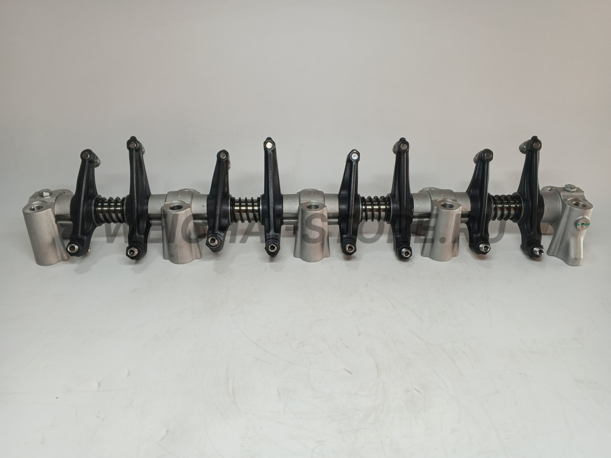 1002843945 Ось коромысел с упорами в сборе